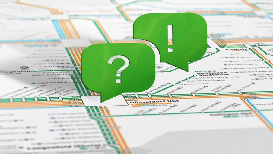 Zwei Sprechblasen mit einem Ausrufezeichen und einem Fragezeichen