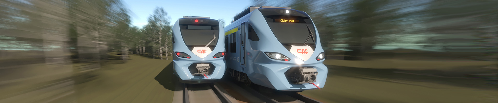 Zwei CAF Züge fahren auf Gleisen nebeneinander